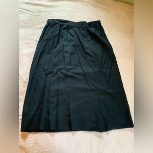 Vintage hand sewn black midi skirt. Approx. size M.